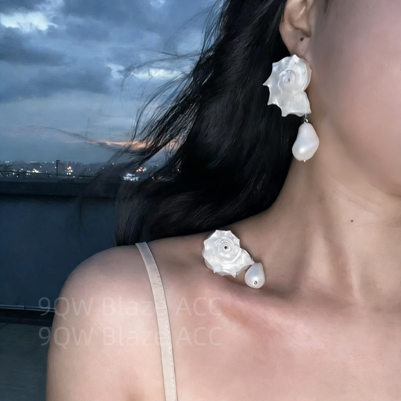 Light luxury artificial baroque natural shell stud earrings women's high-end three-dimensional niche shape earrings are elegant and temperamental