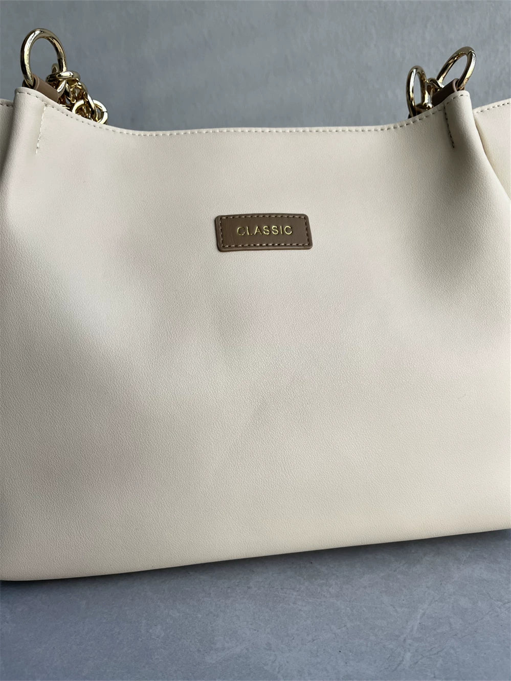 Tail goods clearance high-quality imported cowhide tote bag fashionable and versatile, simple and casual, large capacity one-shoulder armpit women