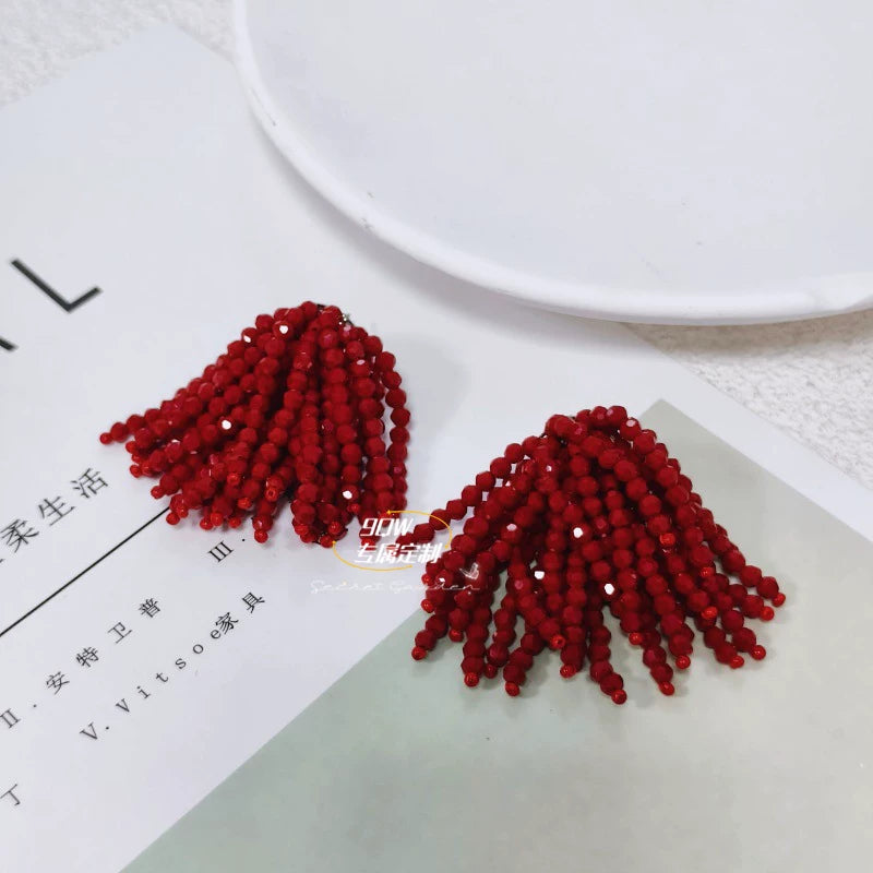 Japanese and Korean French high-end cascading fireworks tassel earrings, women's hand-woven niche designer stud earrings