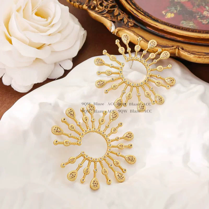 European and American retro gold Yang Mi same style of hollow fireworks earrings female exaggerated high-end niche design stud earrings