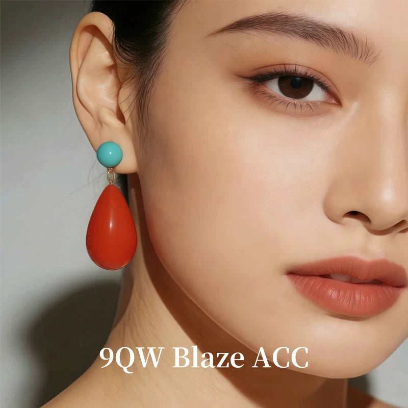 Niche designer vintage red resin drop-shaped tassel earrings 2026 new high-end stud earrings