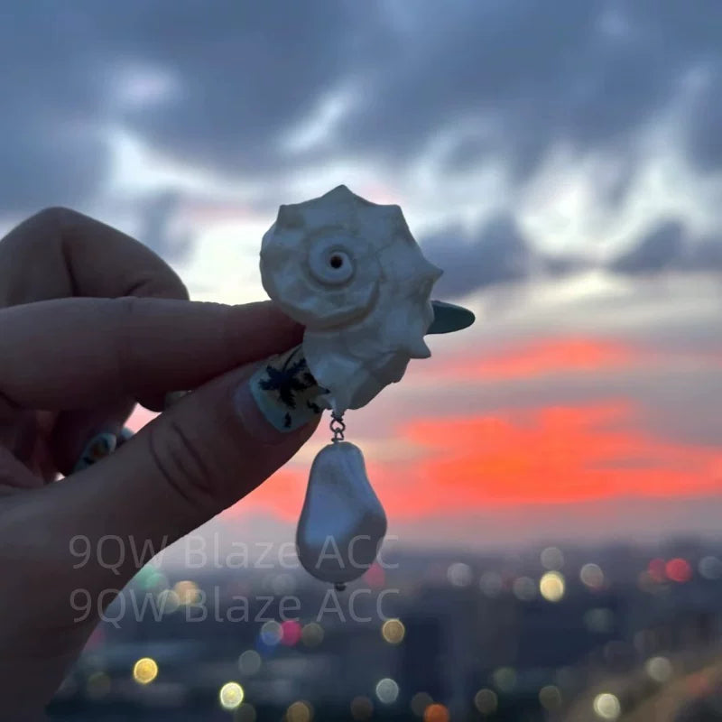 Light luxury artificial baroque natural shell stud earrings women's high-end three-dimensional niche shape earrings are elegant and temperamental