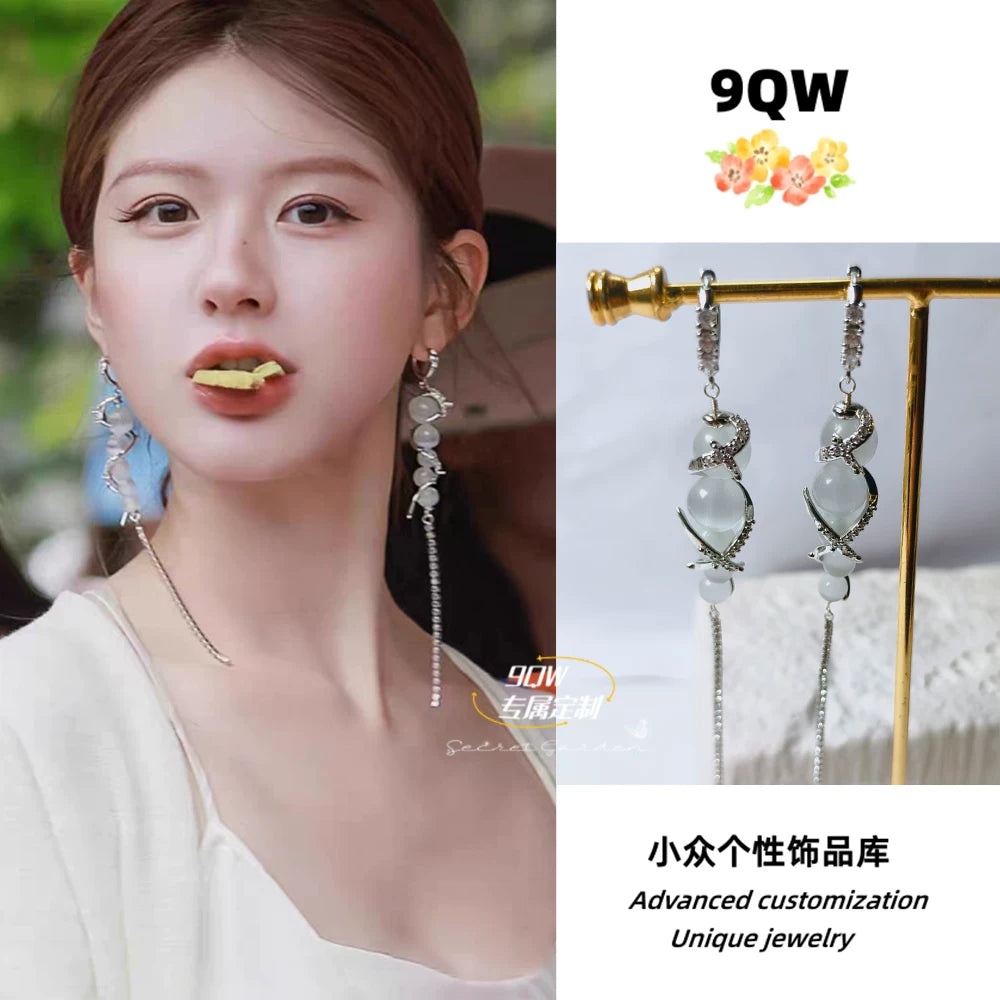 9QW niche high-end Zhao Lusi same cloud pillar earrings, women's light luxury temperament, long cat's eye stone tassel earrings