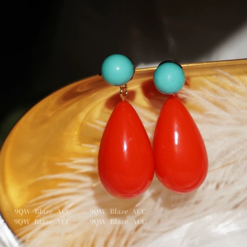 Niche designer vintage red resin drop-shaped tassel earrings 2026 new high-end stud earrings