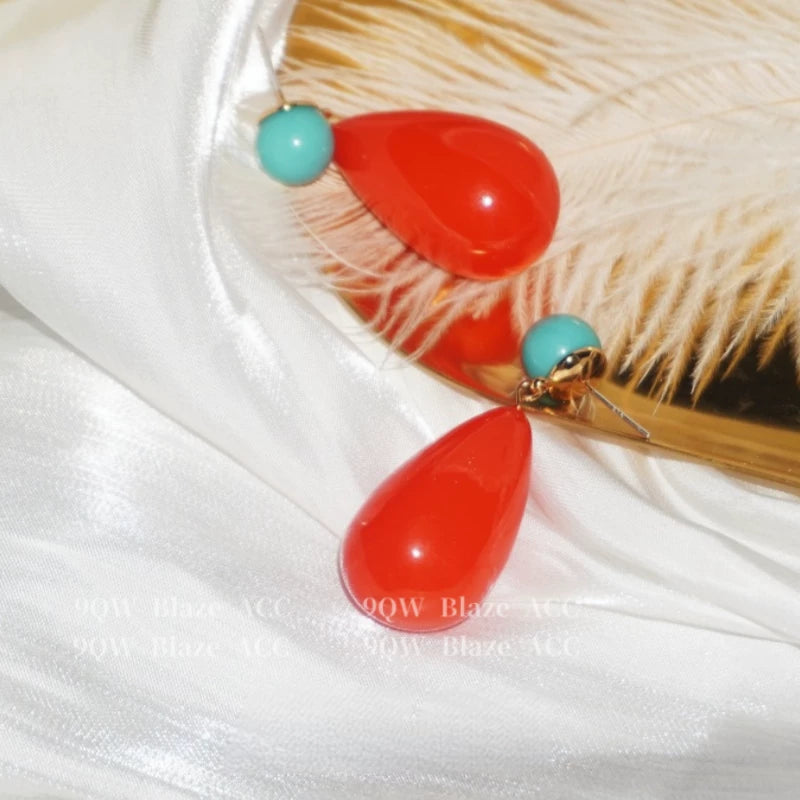 Niche designer vintage red resin drop-shaped tassel earrings 2026 new high-end stud earrings