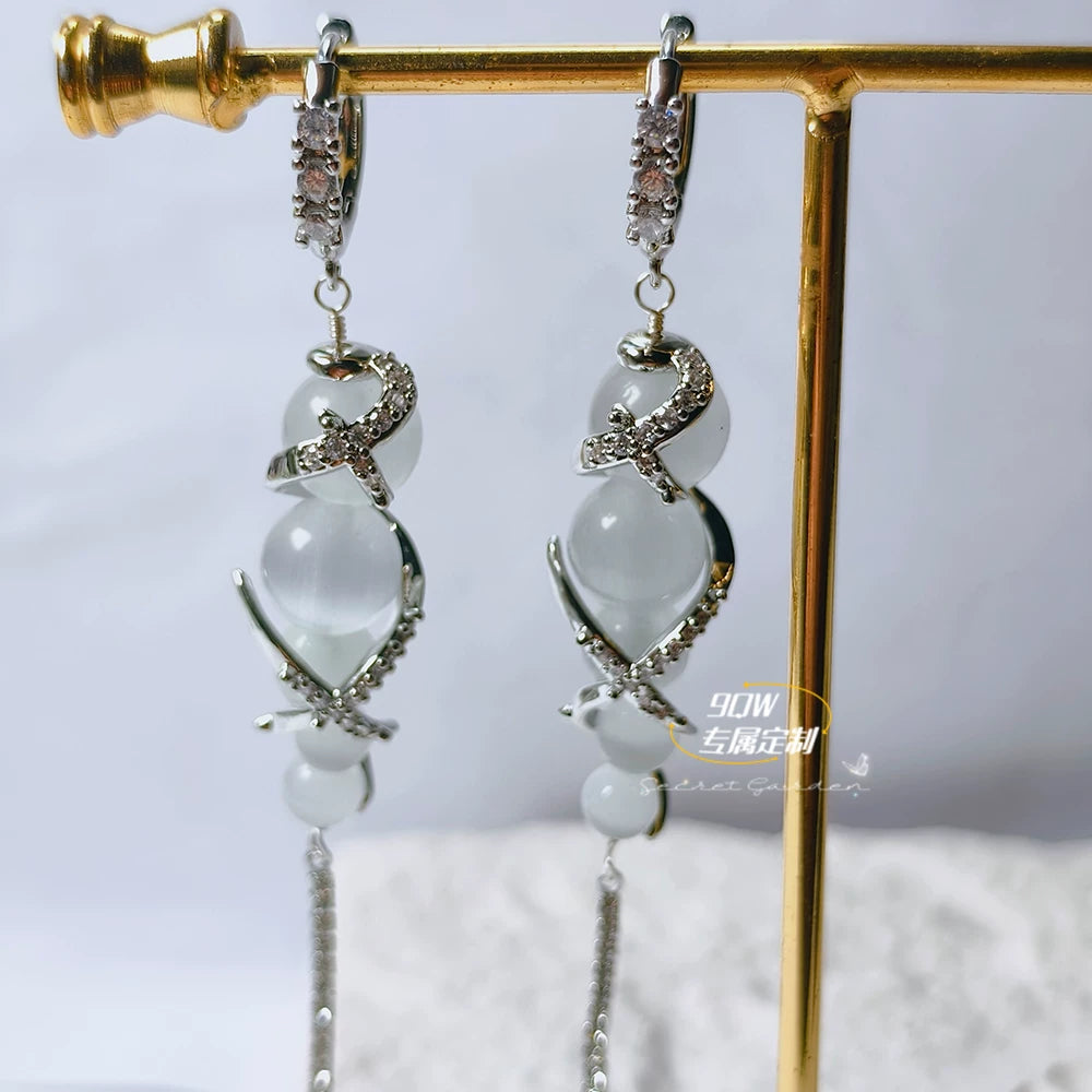 9QW niche high-end Zhao Lusi same cloud pillar earrings, women's light luxury temperament, long cat's eye stone tassel earrings