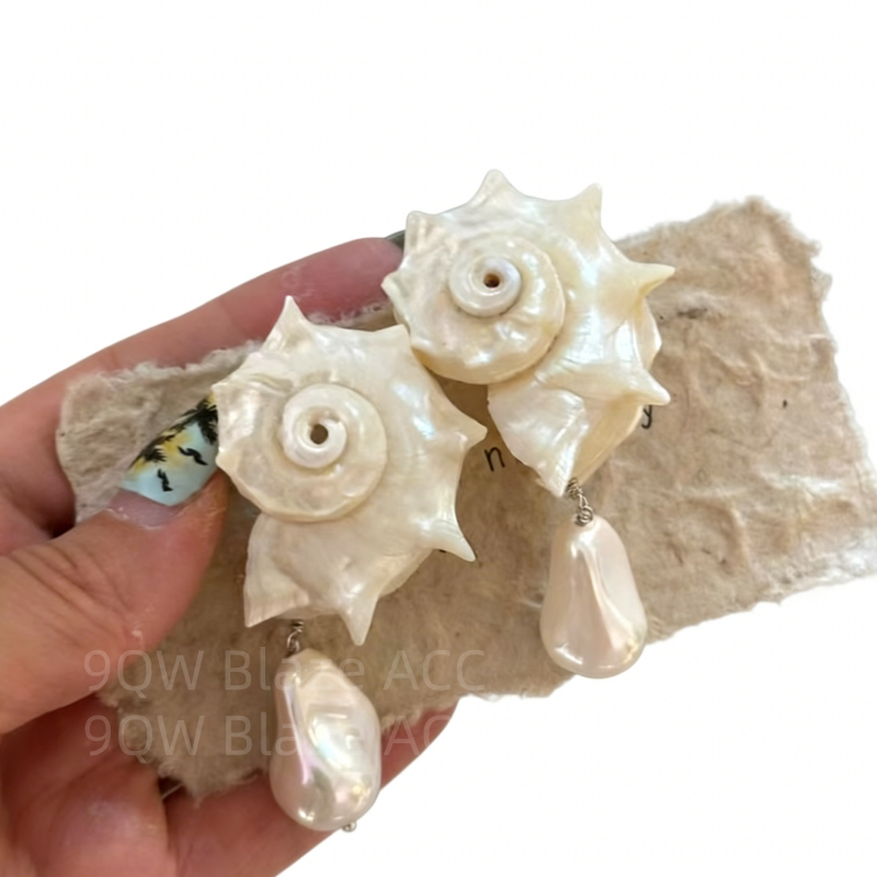 Light luxury artificial baroque natural shell stud earrings women's high-end three-dimensional niche shape earrings are elegant and temperamental
