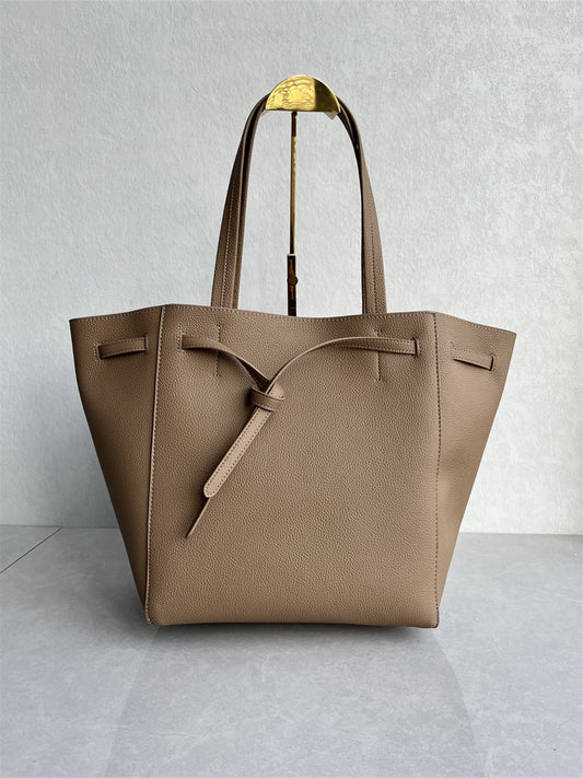 This year's new high-quality cowhide tote bag fashionable and versatile large capacity drawstring bucket bag one shoulder armpit women's bag