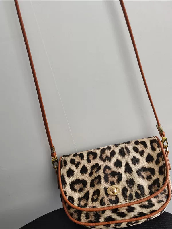 Crossbody bag women's bag 2026 new leopard print niche design shoulder bag armpit bag saddle packaging mobile phone coin purse