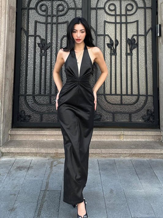 Black PU leather high-end temperament halterneck dress 2026 new hot girl sexy deep V backpack hip skirt