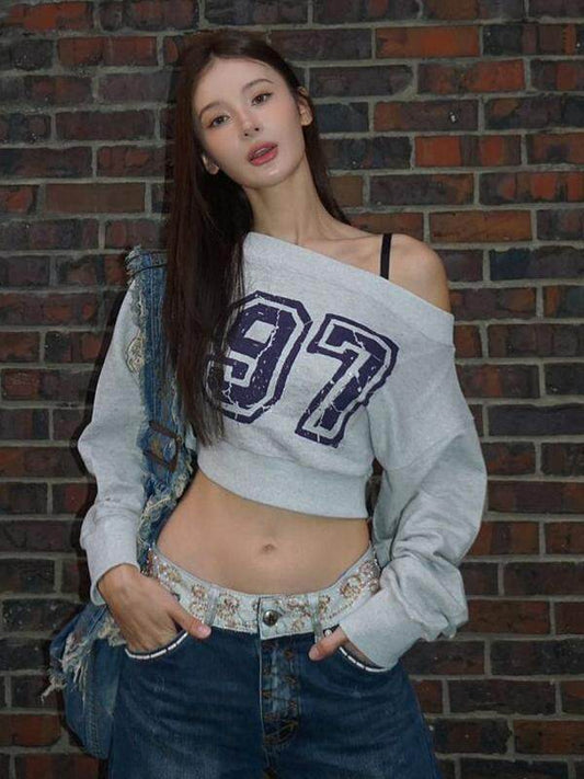 American vintage digital print off-the-shoulder long-sleeved sweatshirt 2026 fall/winter new hot girl slimming versatile cross-shoulder top