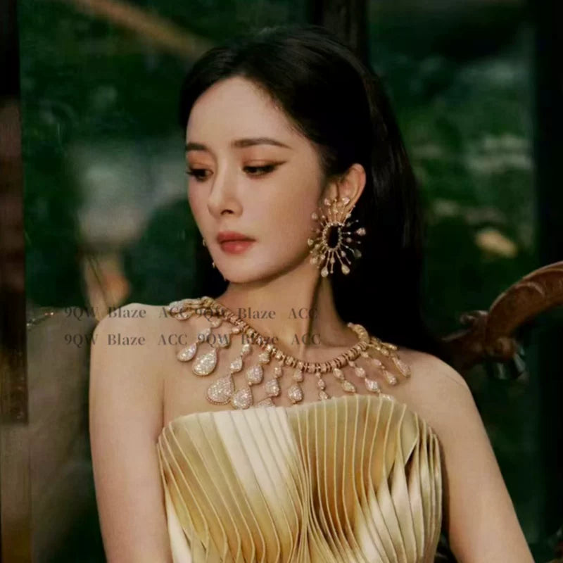 European and American retro gold Yang Mi same style of hollow fireworks earrings female exaggerated high-end niche design stud earrings