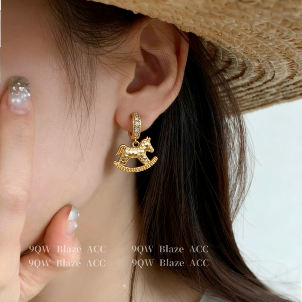 National tide light luxury niche design sense rocking horse earrings female brass diamond high-end earrings fashion temperament stud earrings