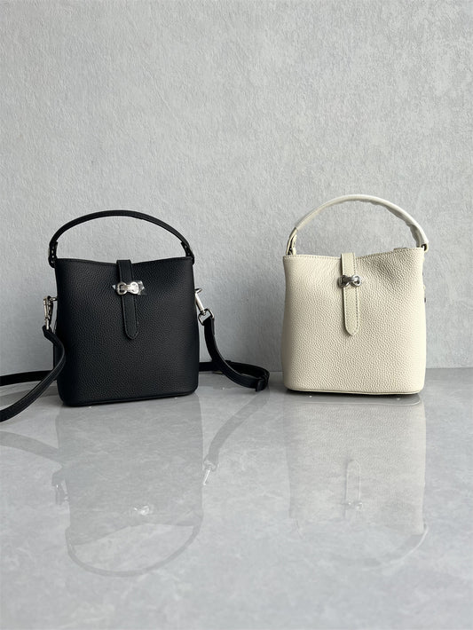 The new products of the season are top-layer cowhide bucket bags exported to South Korea, fashionable and versatile leather, hand-held one-shoulder crossbody women