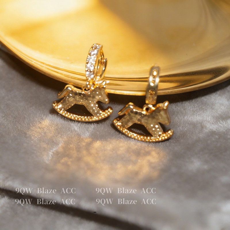 National tide light luxury niche design sense rocking horse earrings female brass diamond high-end earrings fashion temperament stud earrings