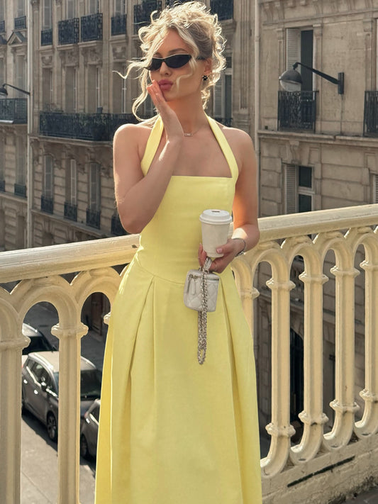 Southern French resort style solid color high-end halterneck dress 2026 summer new hot girl slim slim long skirt girl