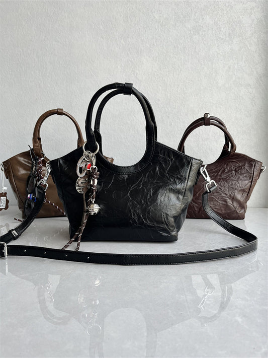 2025 new vegetable basket top layer cowhide oil wax leather hand scratch pattern high-end sense versatile hand-to-shoulder crossbody women's bag