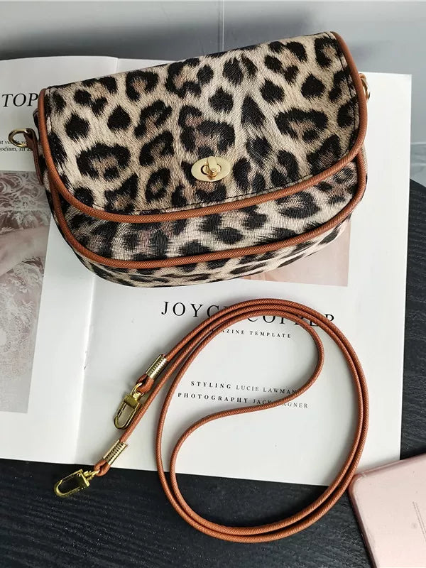 Crossbody bag women's bag 2026 new leopard print niche design shoulder bag armpit bag saddle packaging mobile phone coin purse