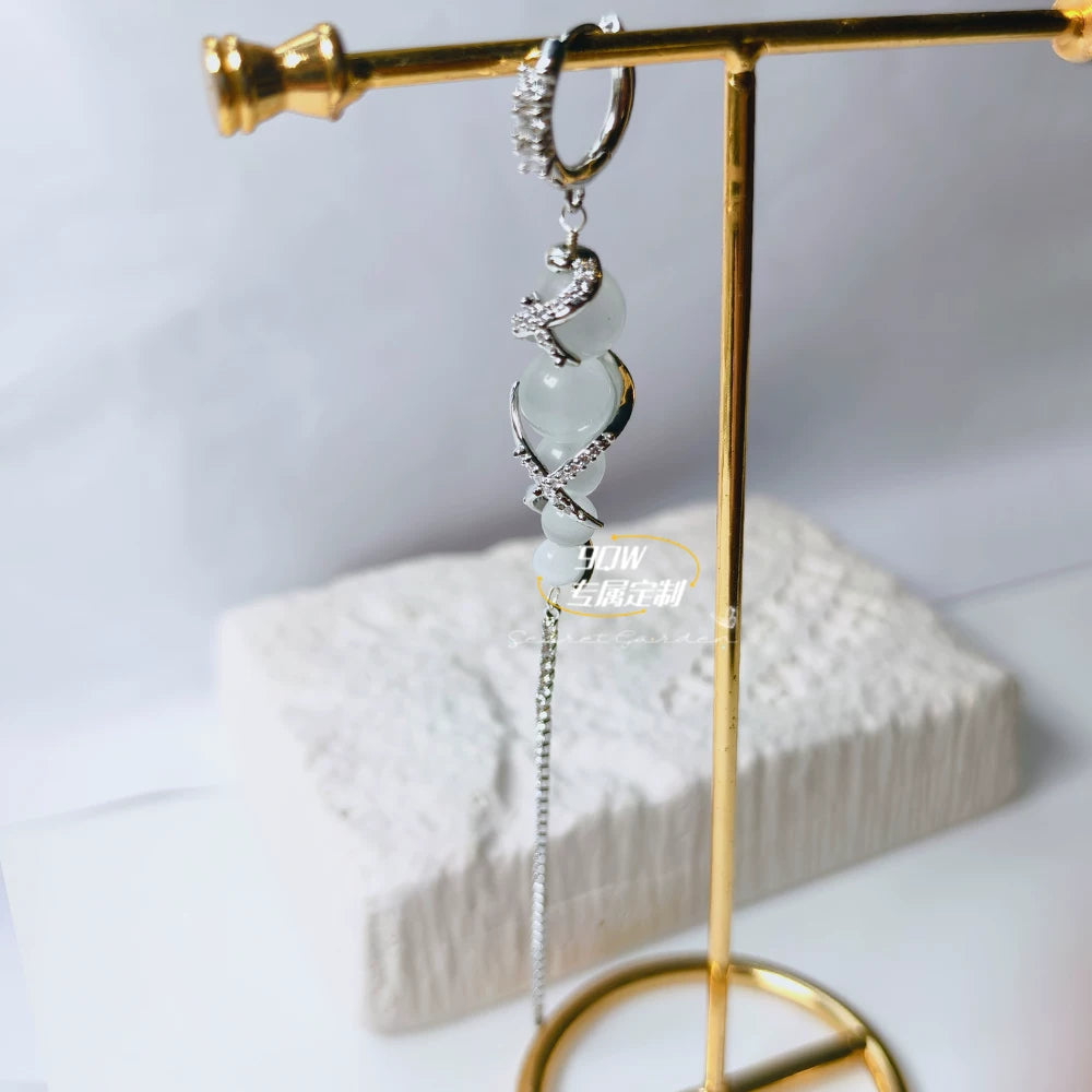 9QW niche high-end Zhao Lusi same cloud pillar earrings, women's light luxury temperament, long cat's eye stone tassel earrings