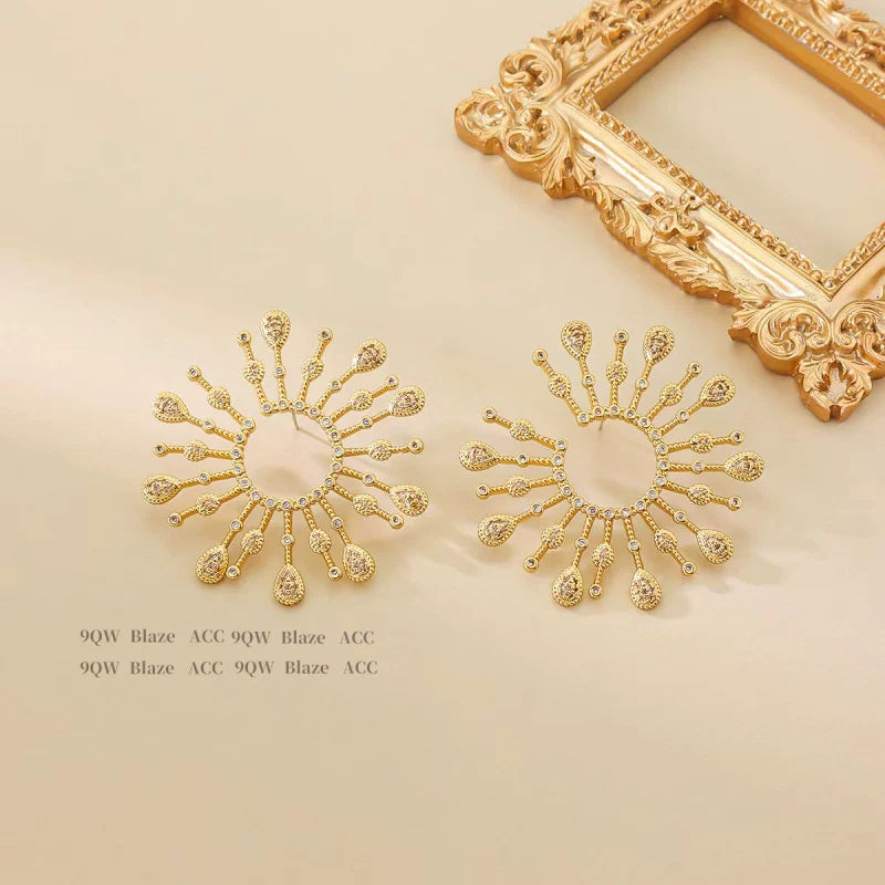 European and American retro gold Yang Mi same style of hollow fireworks earrings female exaggerated high-end niche design stud earrings