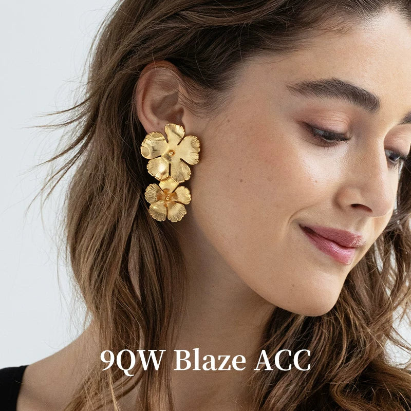European and American new retro exaggerated flower stud earrings three-dimensional craft niche design 925 silver needle personalized metal texture