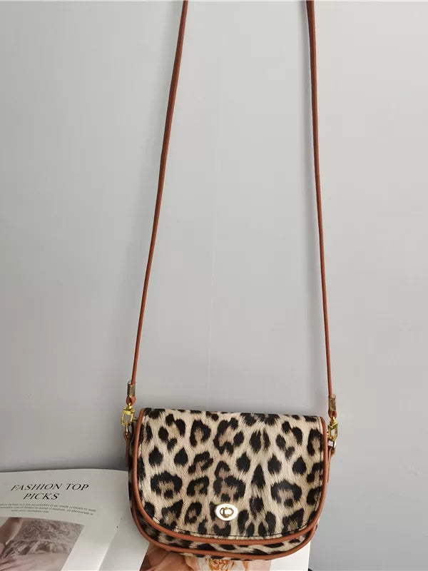 Crossbody bag women's bag 2026 new leopard print niche design shoulder bag armpit bag saddle packaging mobile phone coin purse