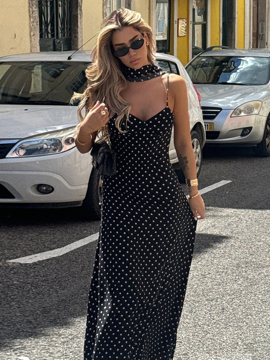 Resort style fashion polka dot V-neck camisole dress 2026 summer new hot girl sexy big backless long skirt female