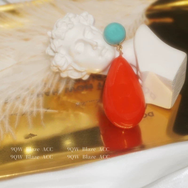 Niche designer vintage red resin drop-shaped tassel earrings 2026 new high-end stud earrings