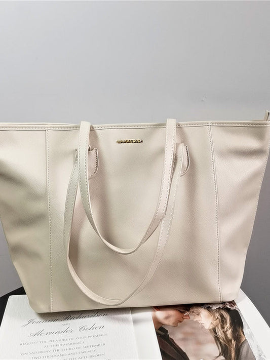 Export large capacity tote bag women's simple commuter handbag shoulder bag niche not easy to collide with practical type lightweight