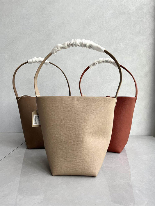 High-quality explosive cowhide bucket bag Korean version fashion and versatile popular simple commuter mother-in-law bag carrying armpit women