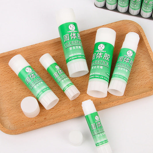 High viscosity solid glue stick large super glue financial diy office wholesale supplies safe non-toxic and odorless quick-drying pvp stick glue children's handmade kindergarten primary school junior high school students for use