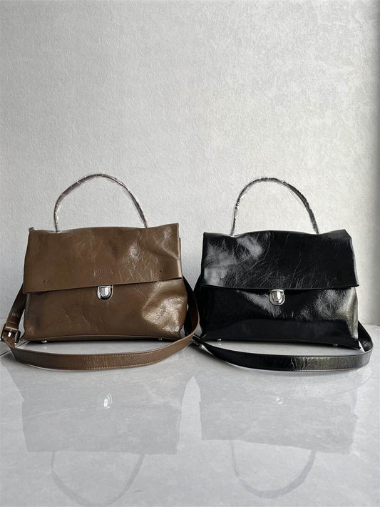 Export foreign trade tail single oil wax top layer cowhide messenger bag niche design high-end texture handbag shoulder crossbody woman