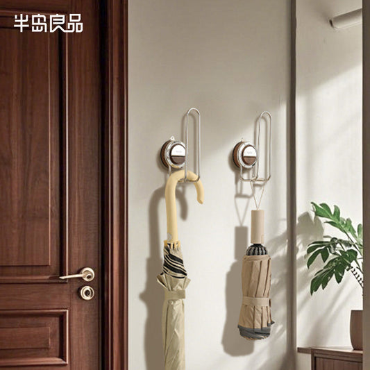 Umbrella storage rack Umbrella storage rack at the door of the house, commercial drainage artifact hanging into the door, bracket to install the umbrella barrel