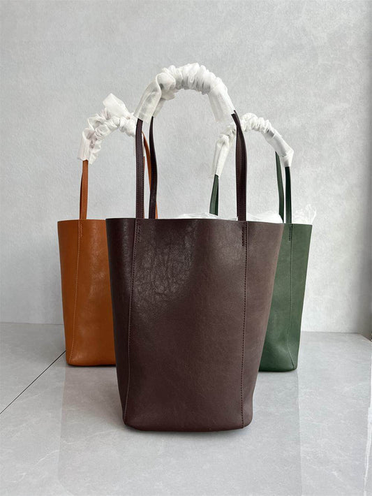 Foreign trade order tail goods Korean version of high quality vegetable tanned cowhide bucket bag simple retro commuter child and mother bag armpit female