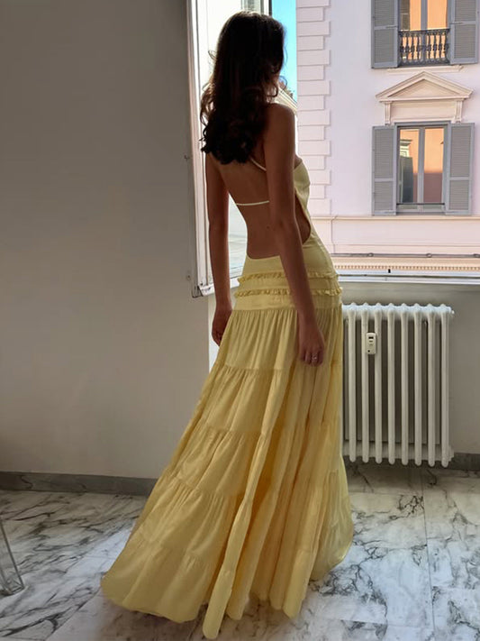 Resort style yellow sexy open back slanted shoulder camisole dress 2026 summer outfit lace slim temperament long skirt