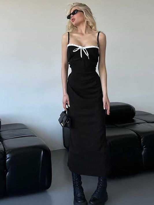 Black and white color-blocking high-end suspender dress 2026 summer new hot girl slim slim sexy hip length skirt